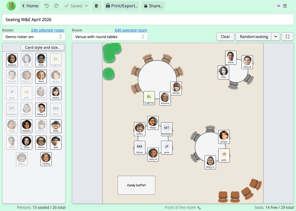 A screenshot of the Seating Chart Maker software where a wedding seating chart is being created for a reception or dinner event with four different size round tables for 25 guests. The room has a solid color floor, decorative plants and a small buffet table. Person cards show person names and portraits and visually indicate where the person is seated.