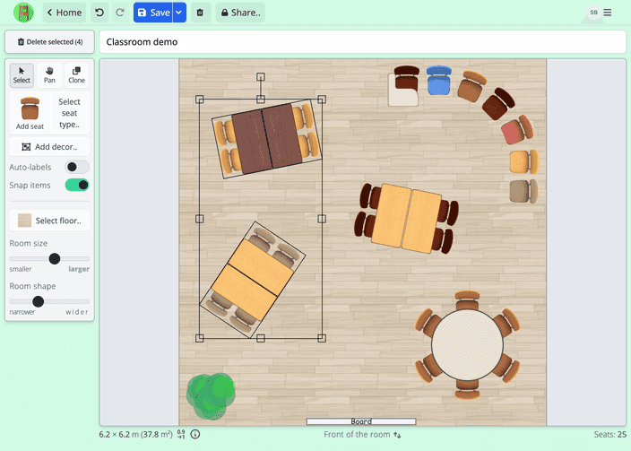 A screenshot of the room creator in Seating Chart Maker. A classroom layout is being created with chairs and table groups. Two table groups are selected for rotation or moving.