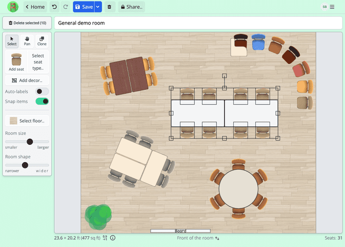 Room creator screenshot in Seating Chart Maker. A room layout is being created with chairs and tables. A table group with 8 chairs is selected for rotation or moving it.